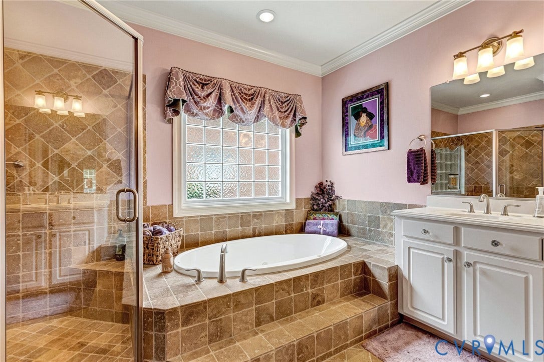 1020 Belva Court, Glen Allen, VA 23059 Bathroom featuring a built-in soaking tub with tile surround, glass block window, and a separate glass-enclosed shower