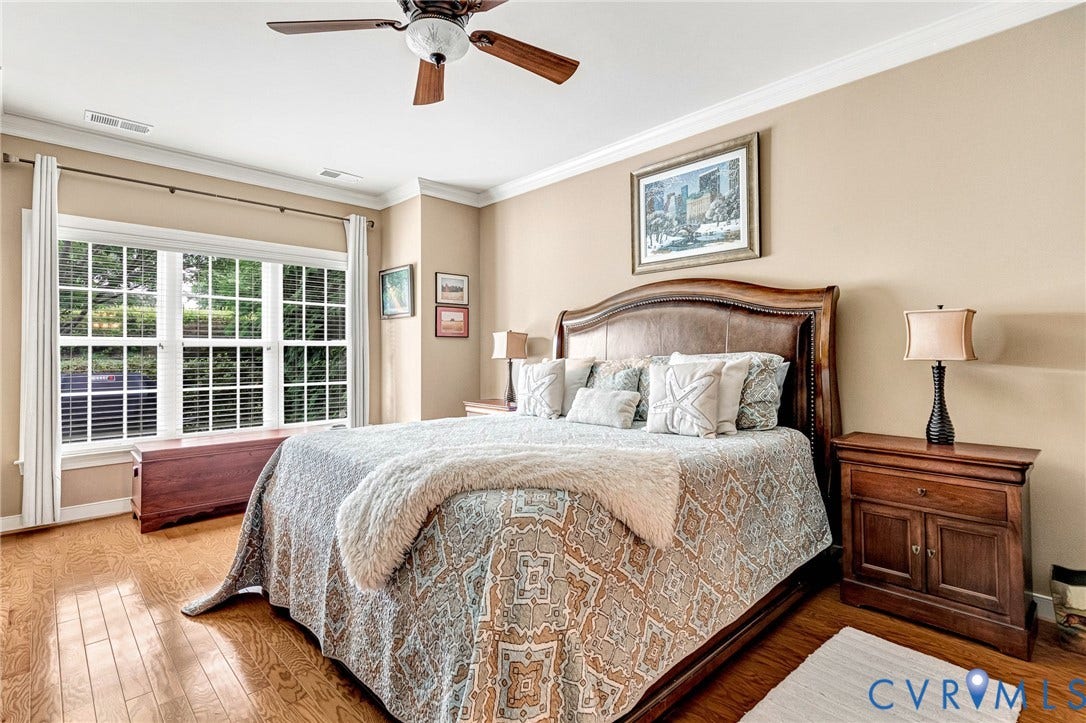 1020 Belva Court, Glen Allen, VA 23059 Bedroom featuring wood-finish flooring, a multi-pane window with blinds, crown molding, and a ceiling fan with light fixture