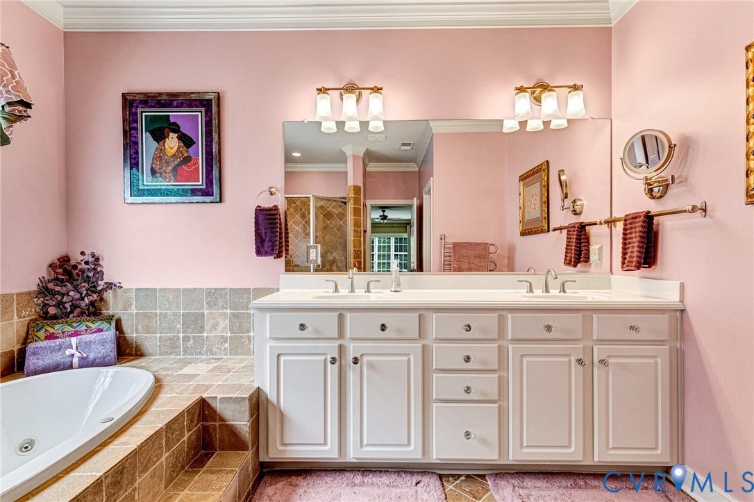 1020 Belva Court, Glen Allen, VA 23059 Double vanity with white cabinetry, dual undermount sinks, and polished chrome fixtures