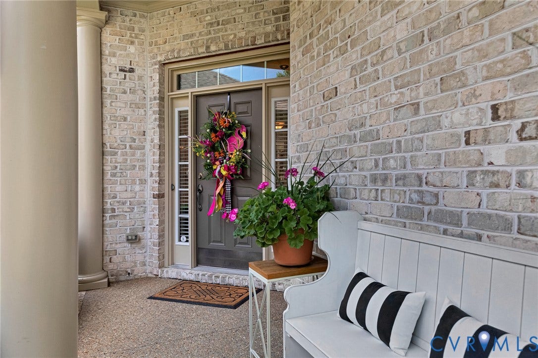 1020 Belva Court, Glen Allen, VA 23059 Brick facade entry with a dark-paneled door, sidelights, and a transom window