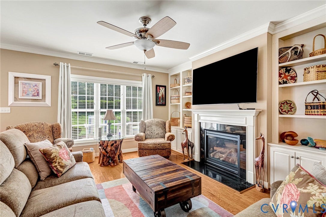 1020 Belva Court, Glen Allen, VA 23059 Living area featuring hardwood flooring, a ceiling fan with light fixture, and crown molding