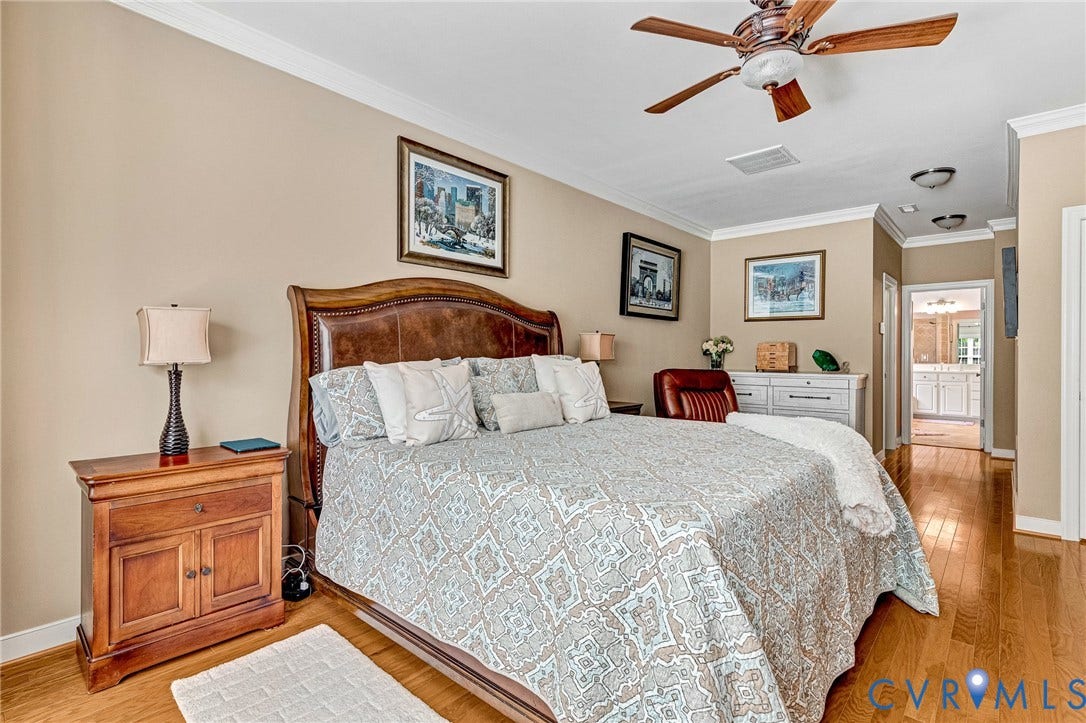 1020 Belva Court, Glen Allen, VA 23059 Bedroom featuring wood-finish flooring, a ceiling fan with integrated lighting, crown molding, and recessed lighting in the hallway