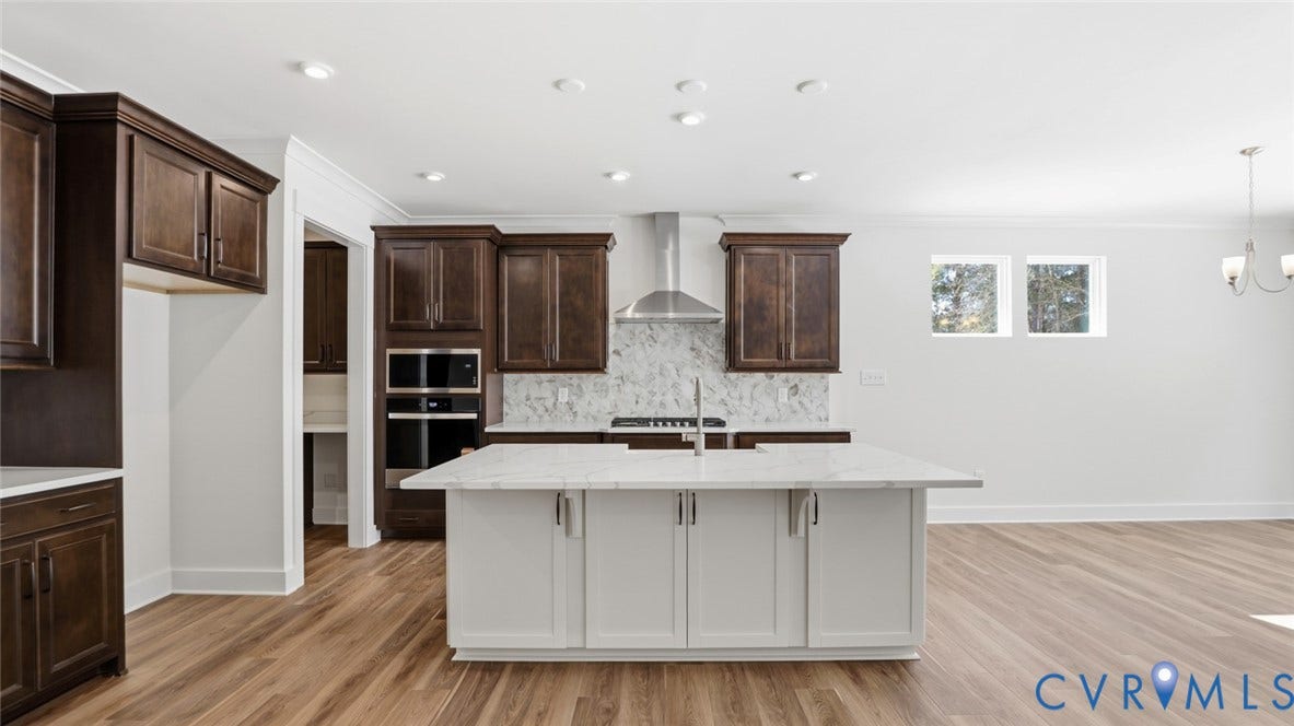 This home is UNDER CONSTRUCTION. The photo represents the plan, not the actual home. Design selections have been made.