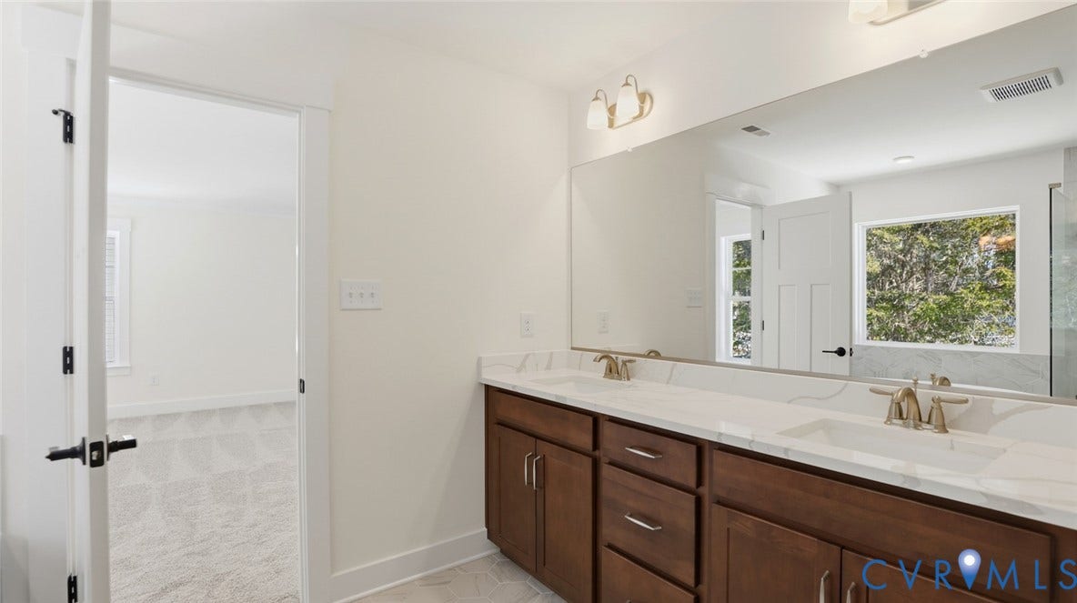 This home is UNDER CONSTRUCTION. The photo represents the plan, not the actual home. Design selections have been made.