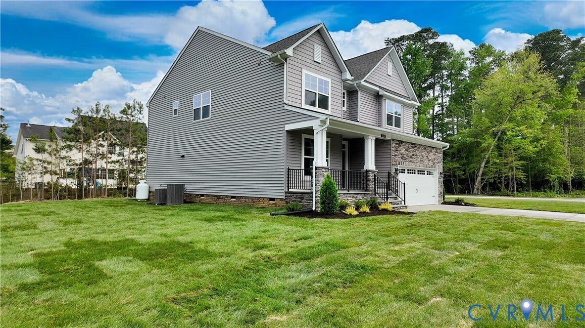 This home is UNDER CONSTRUCTION. The photo represents the plan, not the actual home. Design selections have been made.