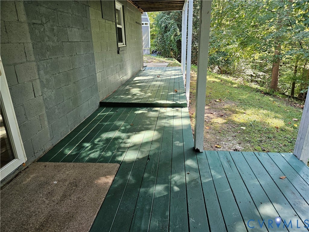 14600 Ramblewood Drive, Chester, VA 23836 Covered wooden deck with painted green planks