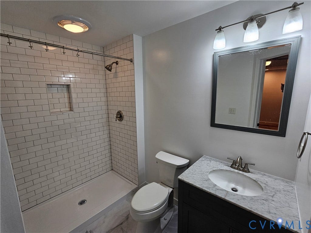 14600 Ramblewood Drive, Chester, VA 23836 Subway tile shower with integrated niche and bronze fixtures