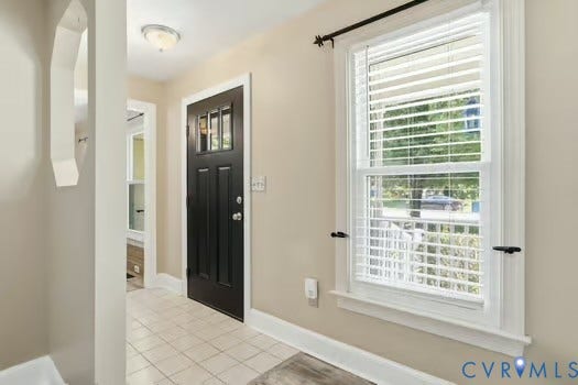 2804 Executive Drive, John Tyler Woods, Chester, VA 23831 Entryway featuring a new black paneled door with glass inserts, transom window, and tiled flooring