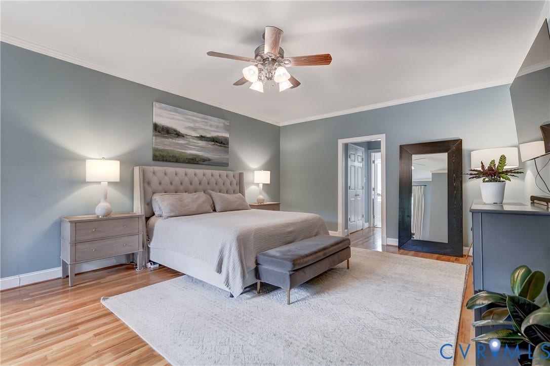 332 Rexmoor Terrace, Richmond, VA 23236 Spacious room featuring wood-finish flooring, a ceiling fan with integrated lighting, and crown molding