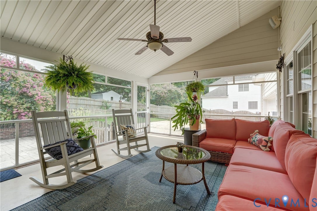 332 Rexmoor Terrace, Richmond, VA 23236 Screened porch featuring a vaulted ceiling with a fan, durable flooring, and exterior wall paneling