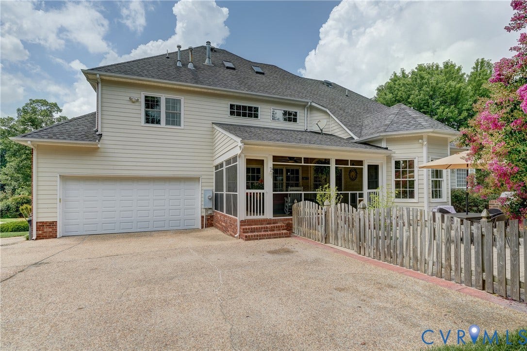 332 Rexmoor Terrace, Richmond, VA 23236 Rear exterior featuring an attached two-car garage, screened porch, and private fenced patio area
