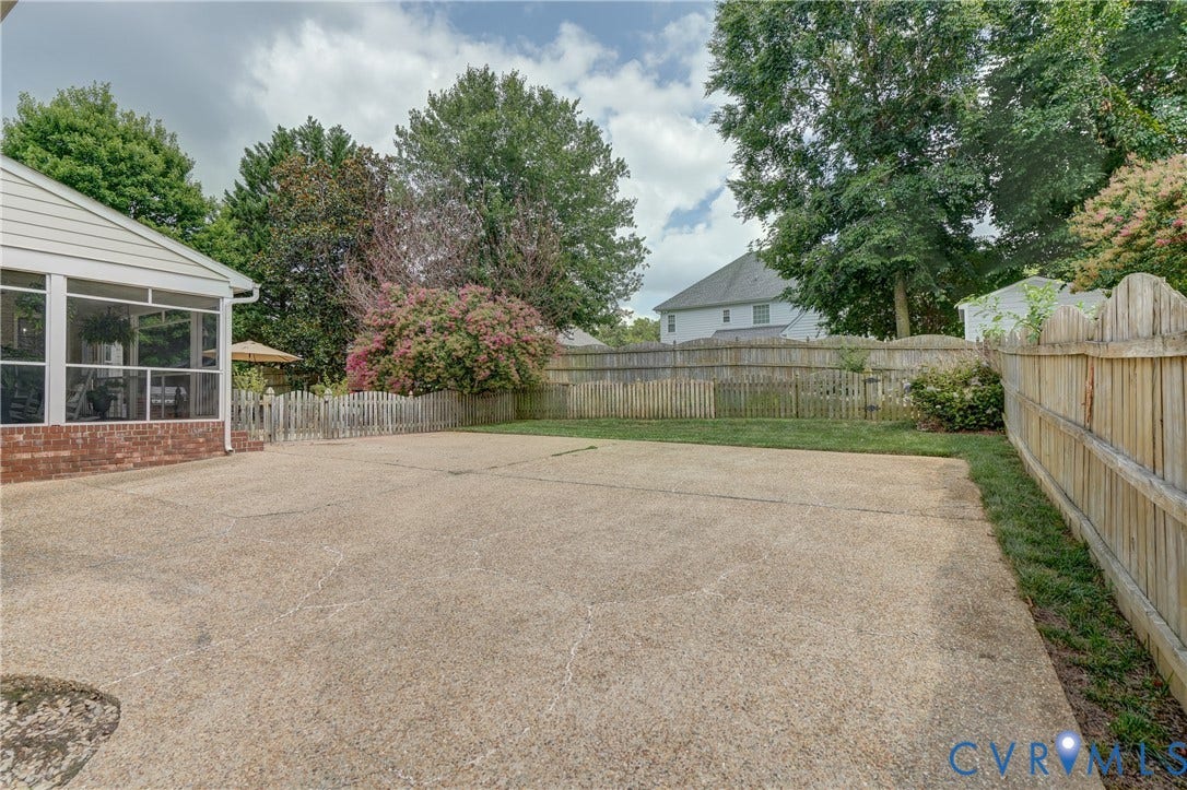 332 Rexmoor Terrace, Richmond, VA 23236 Expansive concrete patio area with a brick base screened porch