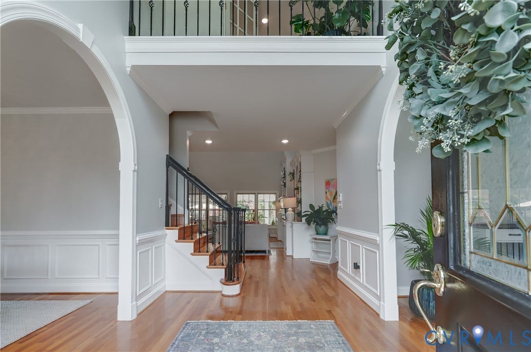 332 Rexmoor Terrace, Richmond, VA 23236 Two-story foyer featuring wood-finish flooring, wainscoting, and arched doorways