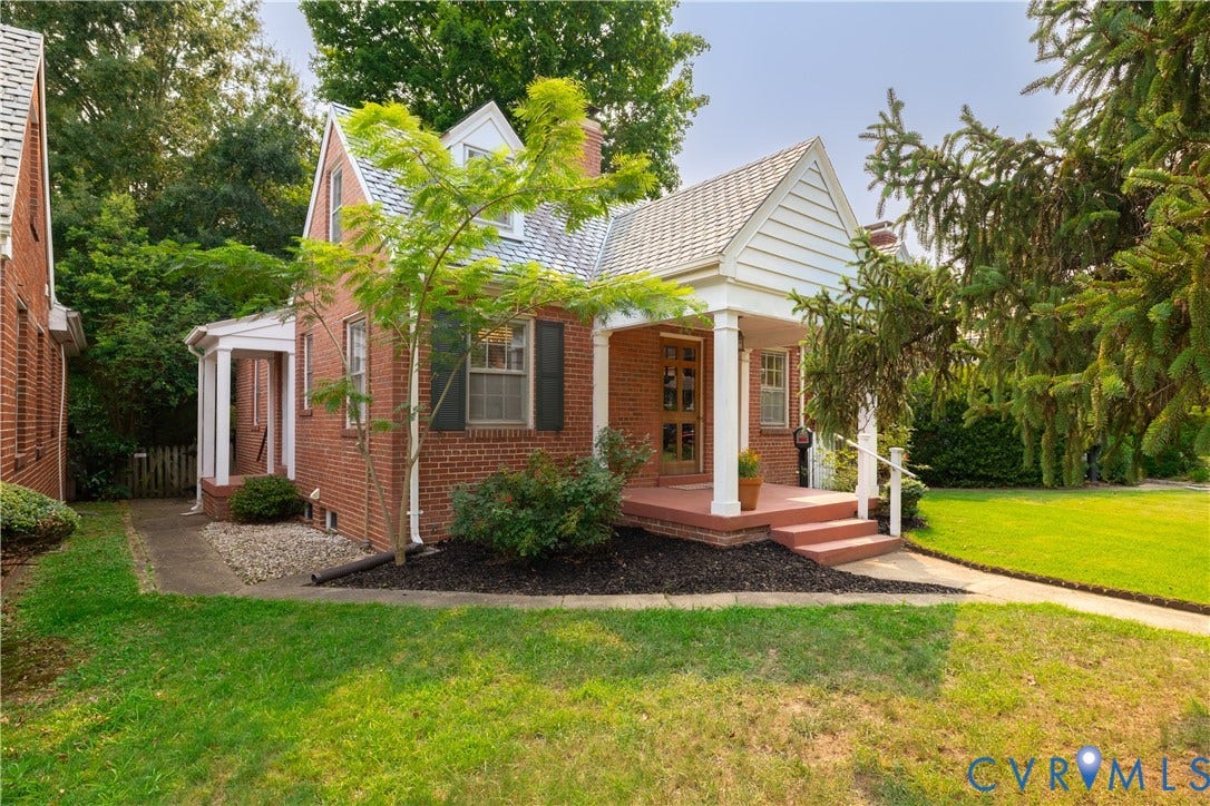 3903 Floyd Avenue, Richmond, VA 23221 Brick exterior featuring a gabled roof and covered front porch