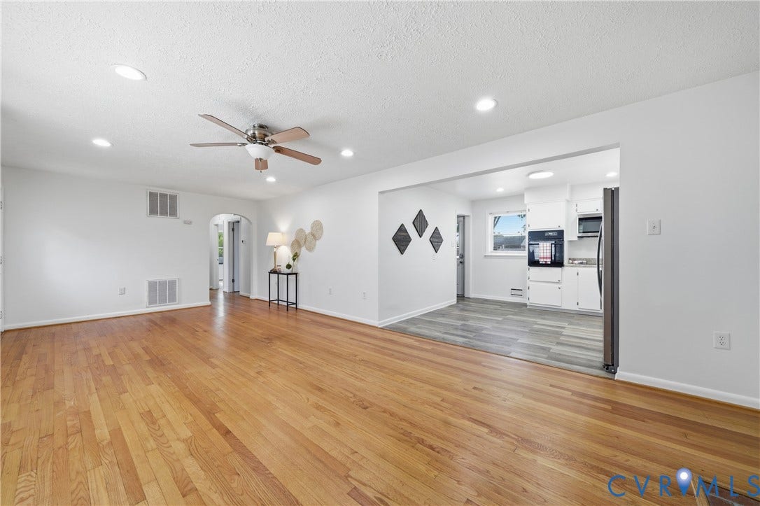 1214 Southbury Avenue, Henrico, VA 23231 Hardwood flooring throughout a bright living space with recessed lighting and a ceiling fan