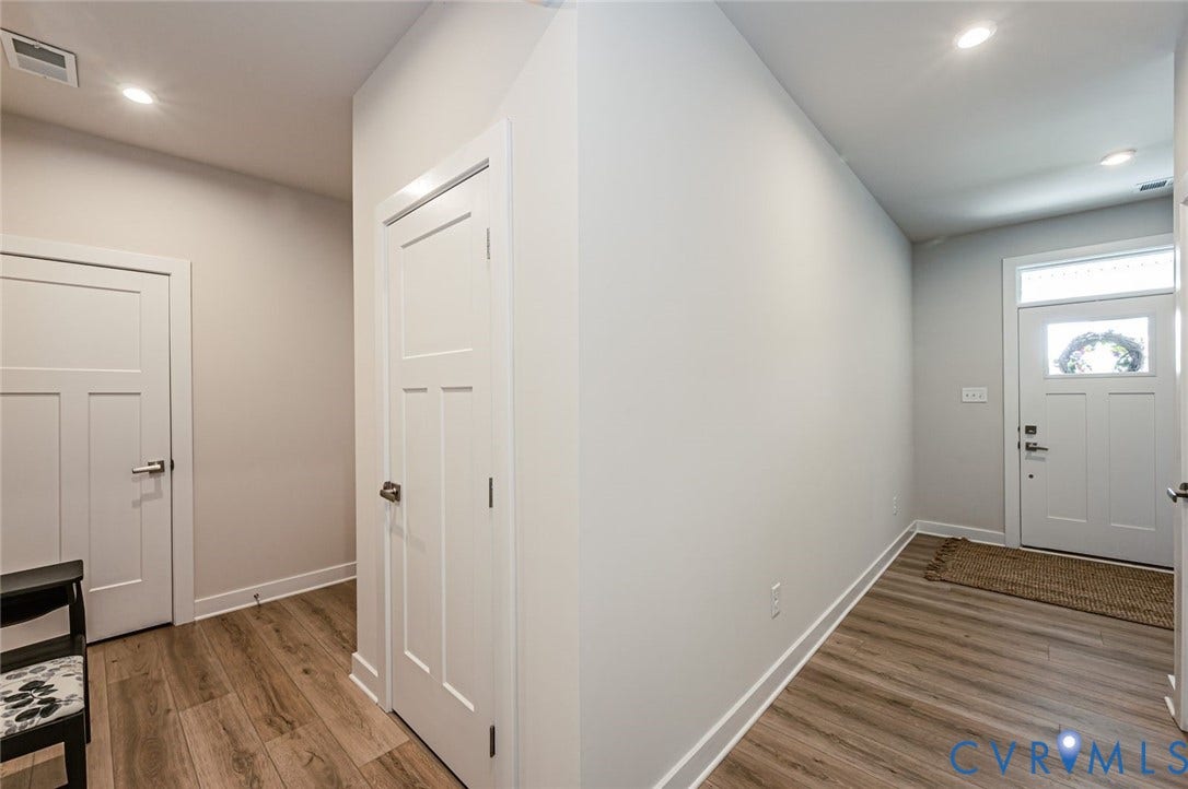 8187 Winter Fog Drive, New Kent, VA 23124 hall to front door and to garage
