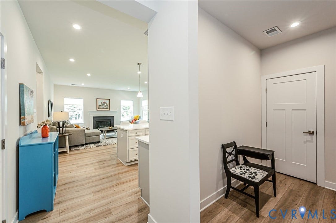 8187 Winter Fog Drive, New Kent, VA 23124 hallway to garage and living area
