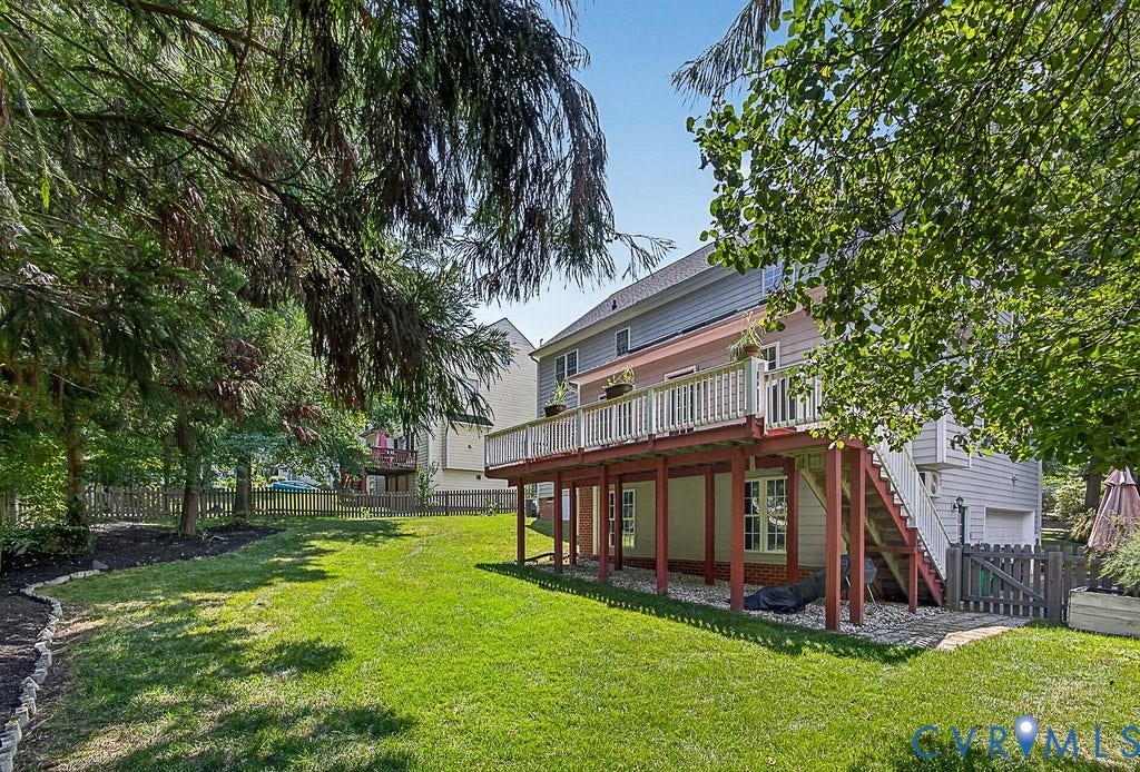 705 Lakewater Drive, Henrico, VA 23229 Professionally landscaped, manicured yard.