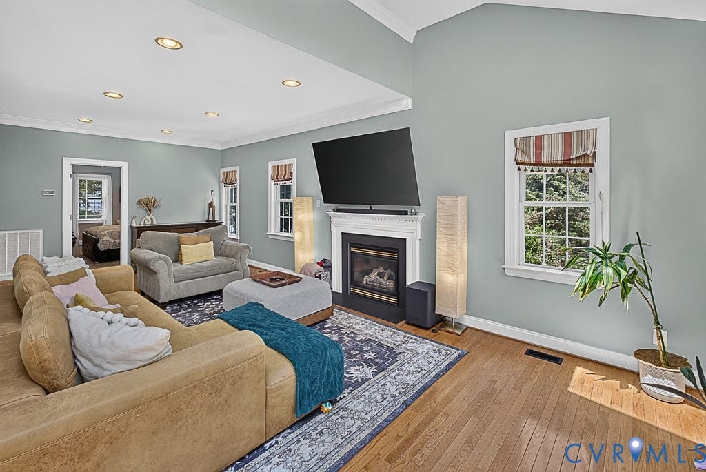 705 Lakewater Drive, Henrico, VA 23229 Spacious & Gas Fireplace, recessed lighting, seamlessly blends from formal rooms.