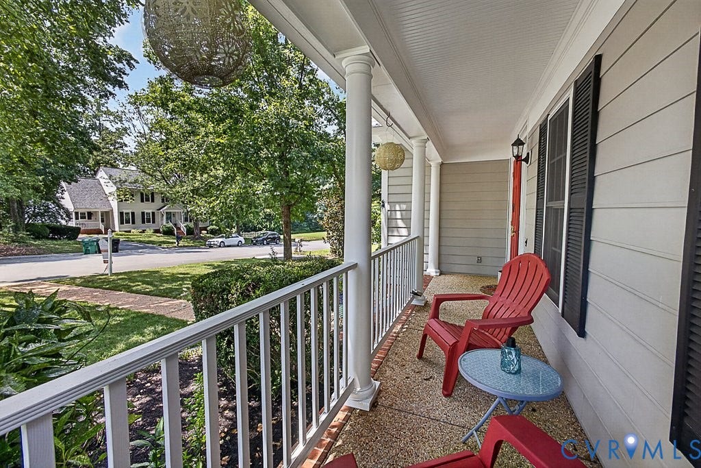 705 Lakewater Drive, Henrico, VA 23229 Inviting front porch, featuring white baluster railing, and classic white columns!