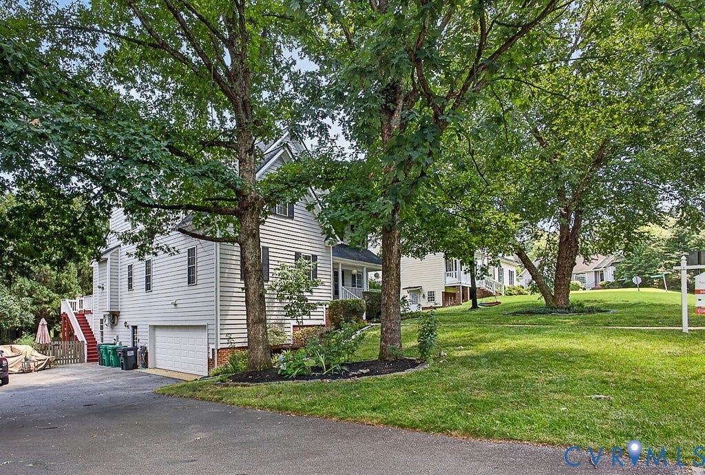 705 Lakewater Drive, Henrico, VA 23229 2-Car Attached Garage, with double-width paved driveway.