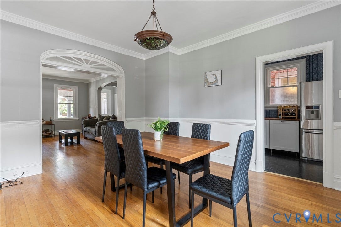 3331 W Grace Street, Monument Avenue, Richmond, VA 23221 Dining area featuring wood-finish flooring, wainscoting, and crown molding