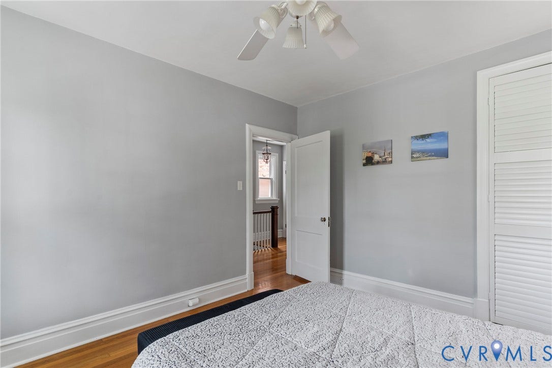 3331 W Grace Street, Monument Avenue, Richmond, VA 23221 Light gray walls complement the wood-finish flooring