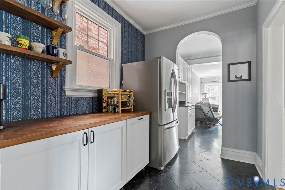 3331 W Grace Street, Monument Avenue, Richmond, VA 23221 Kitchen features wood-finish countertops, white cabinetry with dark hardware, and open wood shelving