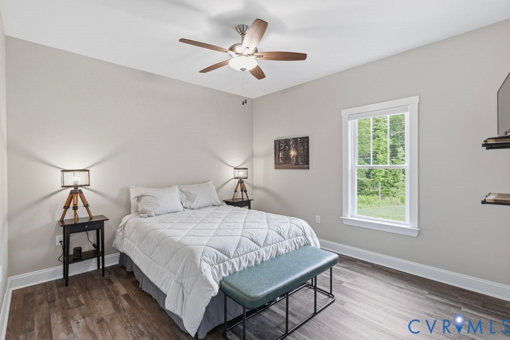 3259 Three Bridge Road, Powhatan, VA 23139 Neutral wall tones complement the wood-finish flooring
