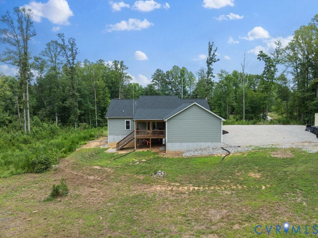 3259 Three Bridge Road, Powhatan, VA 23139 Contemporary home featuring light gray siding and a dark gray asphalt shingle roof