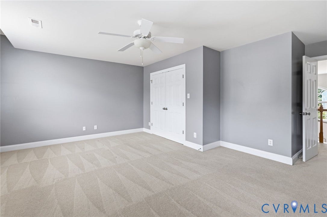2936 Bayfront Way, Midlothian, VA 23112 Second floor primary bedroom with ceiling fan, large closet and a private bathroom.