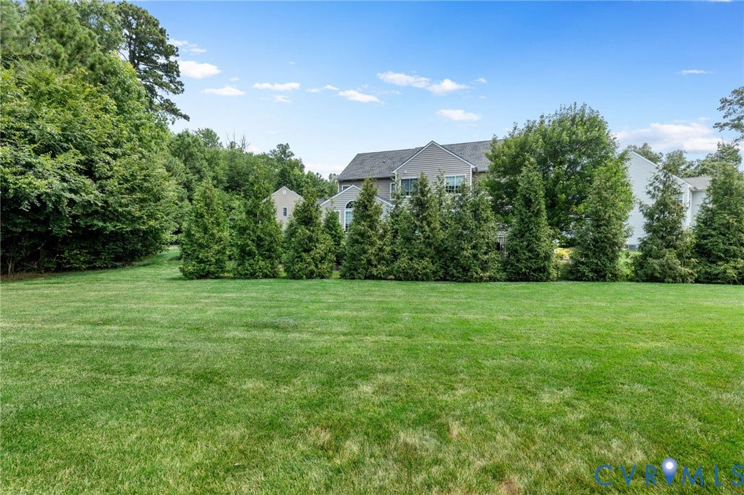2936 Bayfront Way, Midlothian, VA 23112 Located on a large, cul-de-sac lot with low maintenance brick and vinyl siding, country front porch, 2 car side entry garage, paved driveway sealed in 2025, front/rear/side high-end irrigation system and Trex deck that overlooks the spacious rear yard!