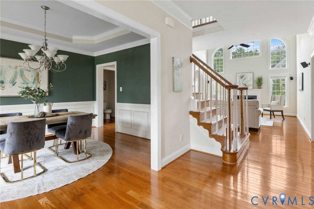 2936 Bayfront Way, Midlothian, VA 23112 Wood floor, double crown molding and coat closet. The foyer opens to the study/living room and the dining room.