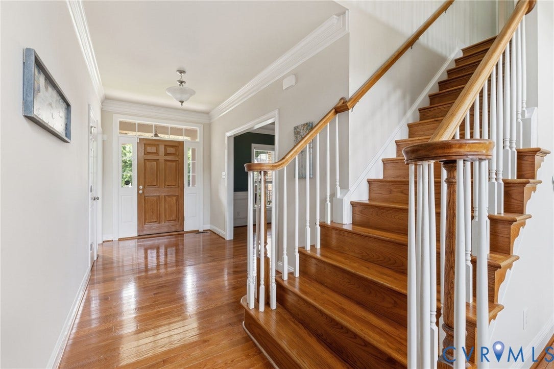 2936 Bayfront Way, Midlothian, VA 23112 Wood floor, double crown molding and coat closet. The foyer opens to the study/living room and the dining room.