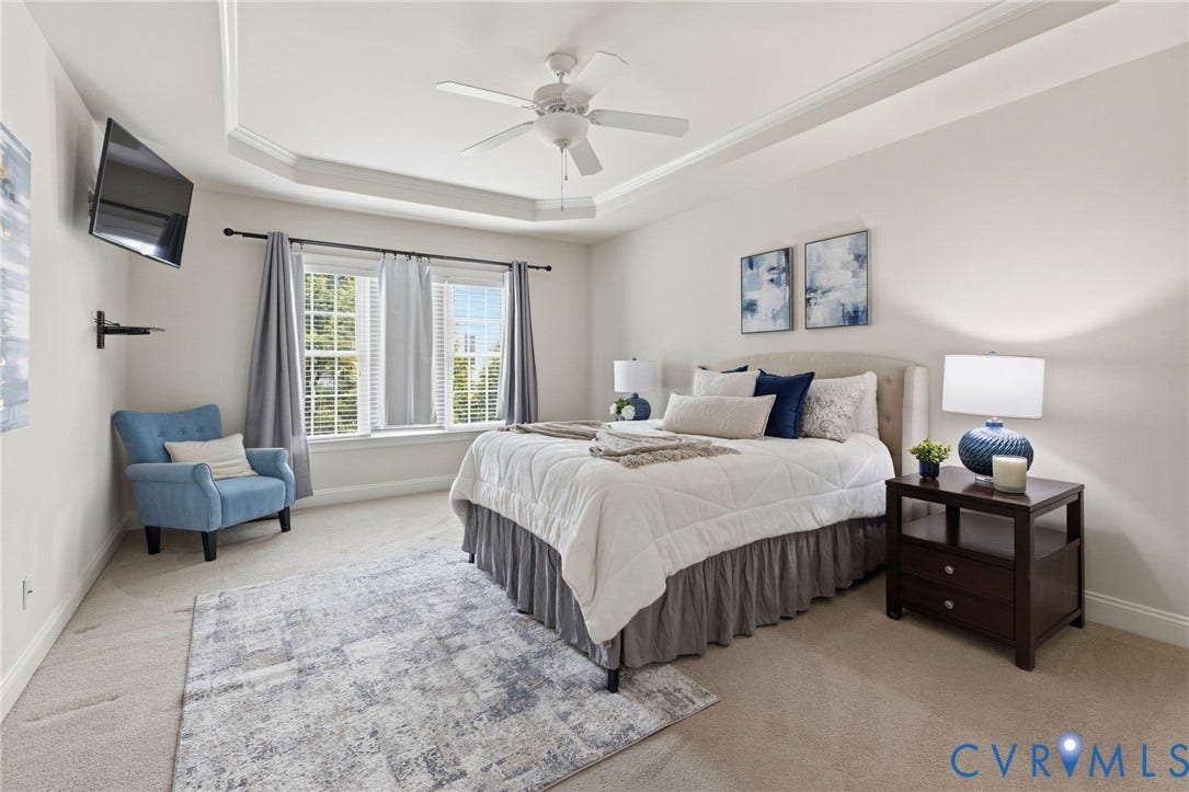 2936 Bayfront Way, Midlothian, VA 23112 First floor primary bedroom with trey ceiling, molding, ceiling fan and a huge walk-in closet.