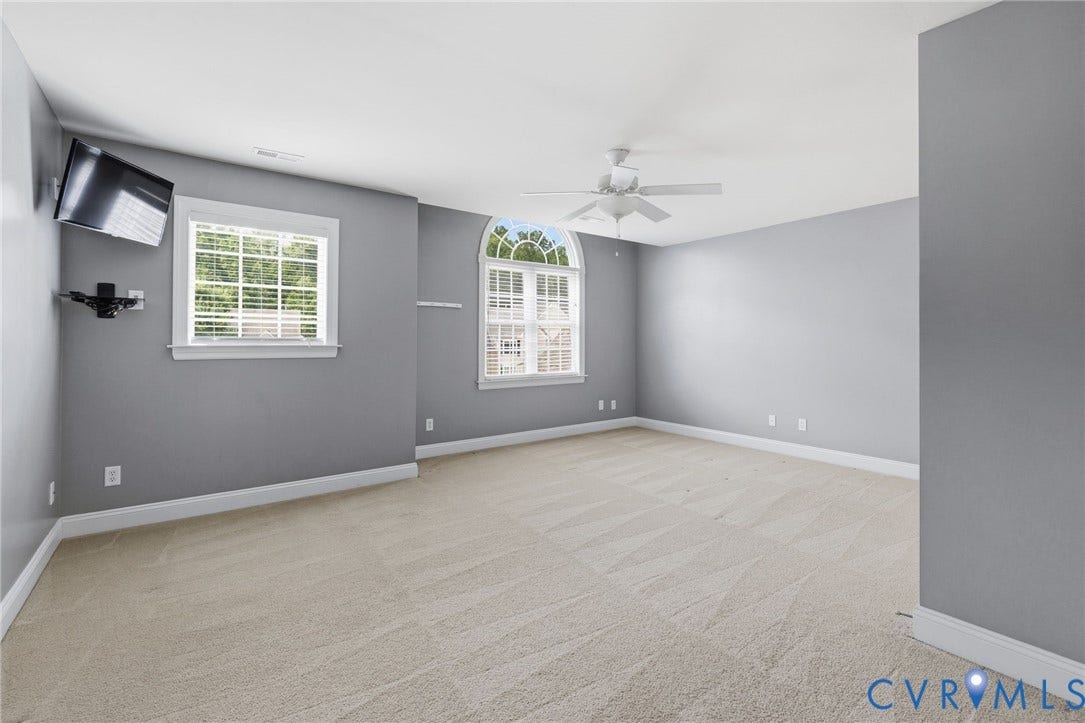 2936 Bayfront Way, Midlothian, VA 23112 Second floor primary bedroom with ceiling fan, large closet and a private bathroom.