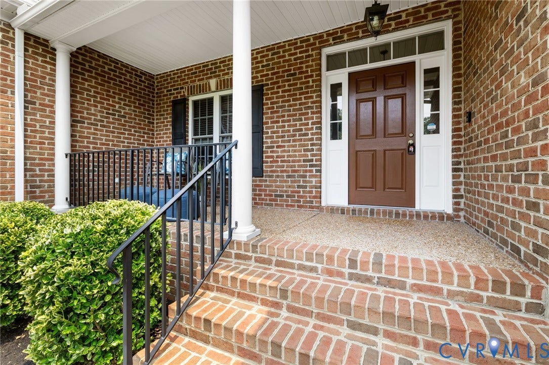 2936 Bayfront Way, Midlothian, VA 23112 Large, country front porch overlooks the spacious front yard with beautiful landscaping.