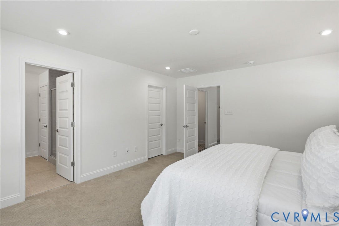 10880 Farmstead Mill Lane, Glen Allen, VA 23059 Neutral-toned wall-to-wall carpeting complements the white walls and trim