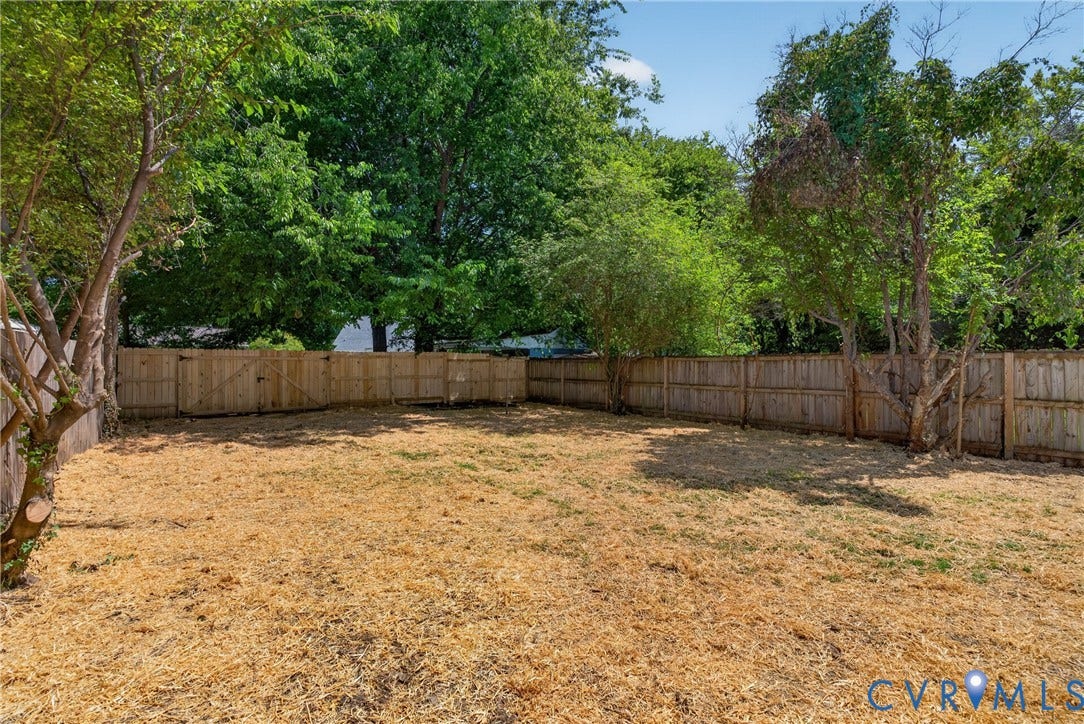 2108 Keswick Avenue, Richmond, VA 23224 LARGE, flat backyard. Fully fenced. 6ft privacy fence. Gate big enough for vehicle entrance.