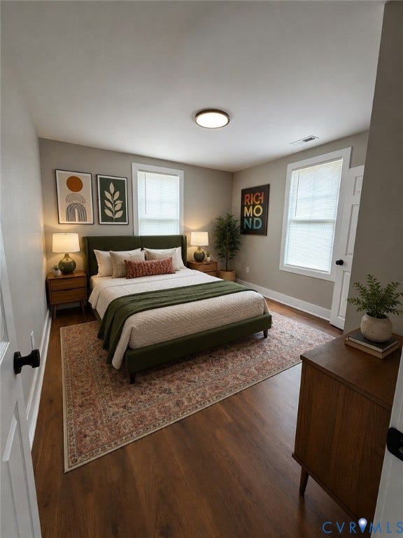 2108 Keswick Avenue, Richmond, VA 23224 Bedroom featuring wood-finish flooring, two large windows with blinds, a flush-mount ceiling light fixture, and white trim