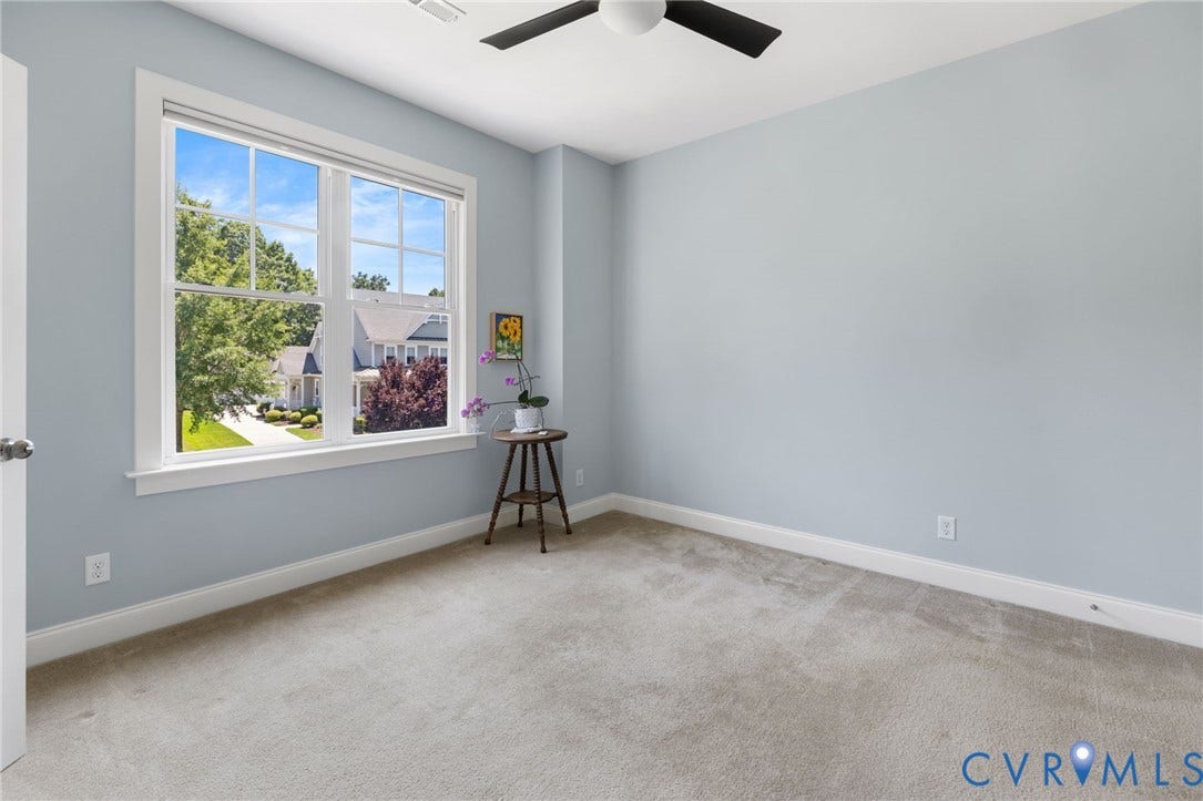 15936 Alsdell Road, Hallsley, Midlothian, VA 23112 Light gray wall paint with white trim, featuring a large multi-pane window
