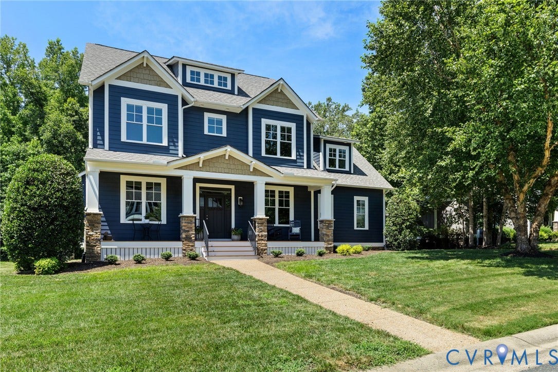 15936 Alsdell Road, Hallsley, Midlothian, VA 23112 Two-story residence featuring deep blue siding and white trim accents