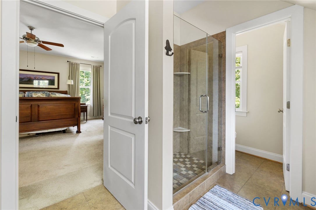 15936 Alsdell Road, Hallsley, Midlothian, VA 23112 Glass-enclosed shower featuring tile flooring and integrated corner shelves
