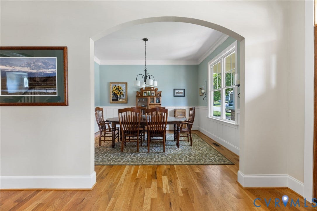 15936 Alsdell Road, Hallsley, Midlothian, VA 23112 Arched entryway framing a room with light blue walls and wainscoting