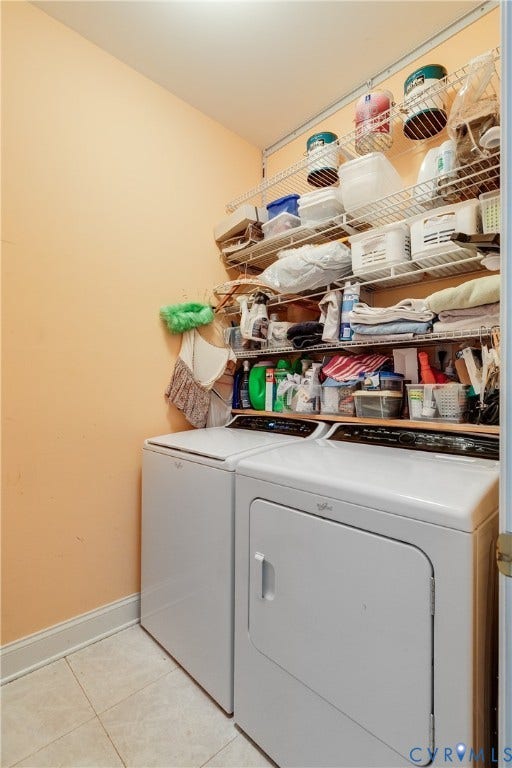 130 Carriage Point Lane, Henrico, VA 23059 Laundry Room Featuring Tile Flooring, Washer/Dryer and Wire Shelving for Extra Storage.