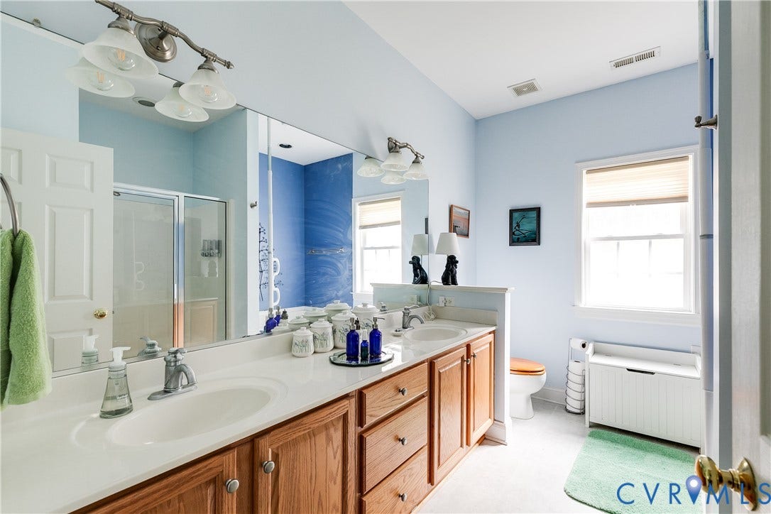 130 Carriage Point Lane, Henrico, VA 23059 Primary En-Suite Bath Featuring Tile Flooring and Double Vanity.