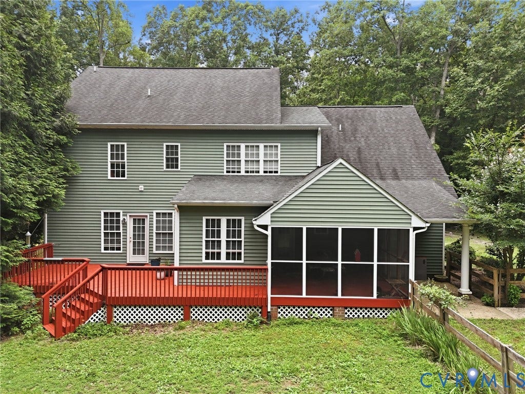3337 Scarlet Oak Drive, Powhatan, VA 23139 Rear exterior featuring a spacious wood deck, a patio