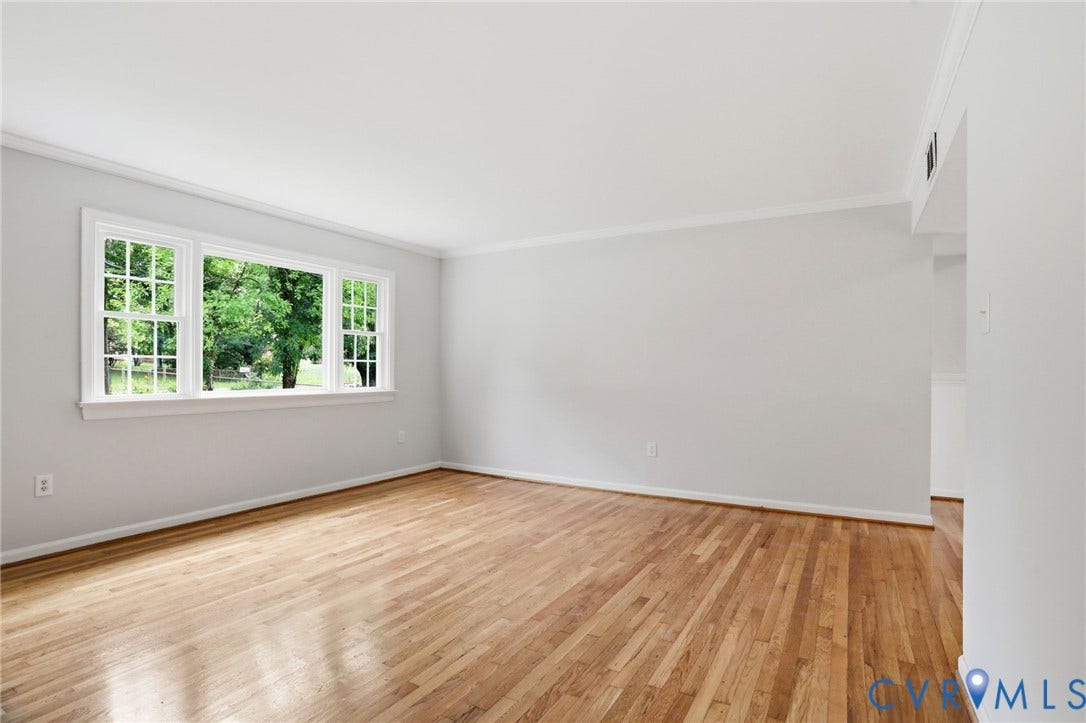 5301 Dalglish Road, Henrico, VA 23223 Bright interior space featuring wood-finish flooring and white baseboards