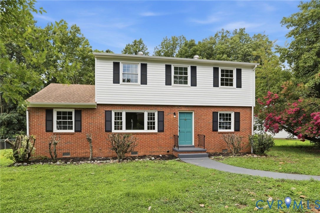 5301 Dalglish Road, Henrico, VA 23223 Two-story residence featuring a brick first level and white siding upper level
