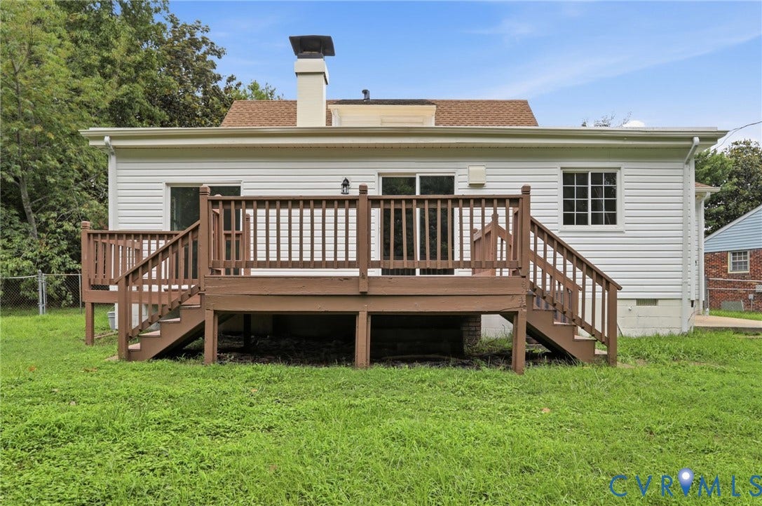 5301 Dalglish Road, Henrico, VA 23223 Expansive rear deck featuring a rich brown finish and dual staircases